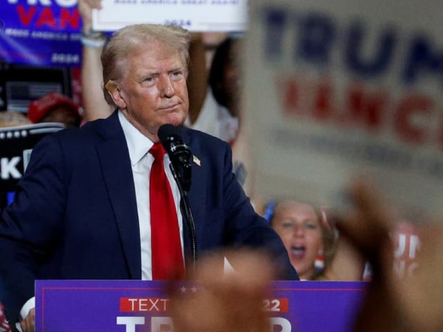 republican presidential nominee and former us president donald trump looks on as he campaigns in charlotte north carolina us july 24 2024 photo reuters